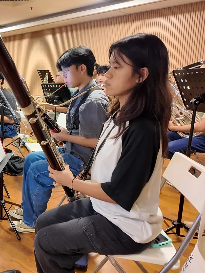 A TWA learner with her bassoon at a band rehearsal
