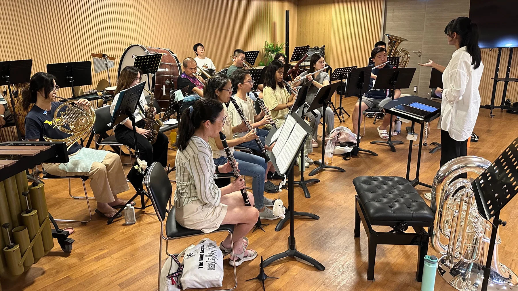The TWA band rehearsing together with the conductor for Finale 2026, learners of every age