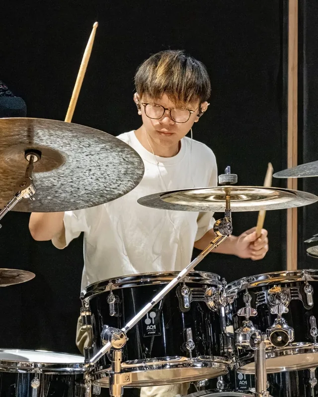 Keyon Toh playing the drumset