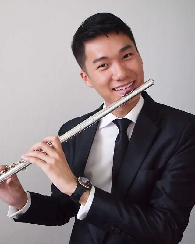 Lee Wen Xiang playing the flute