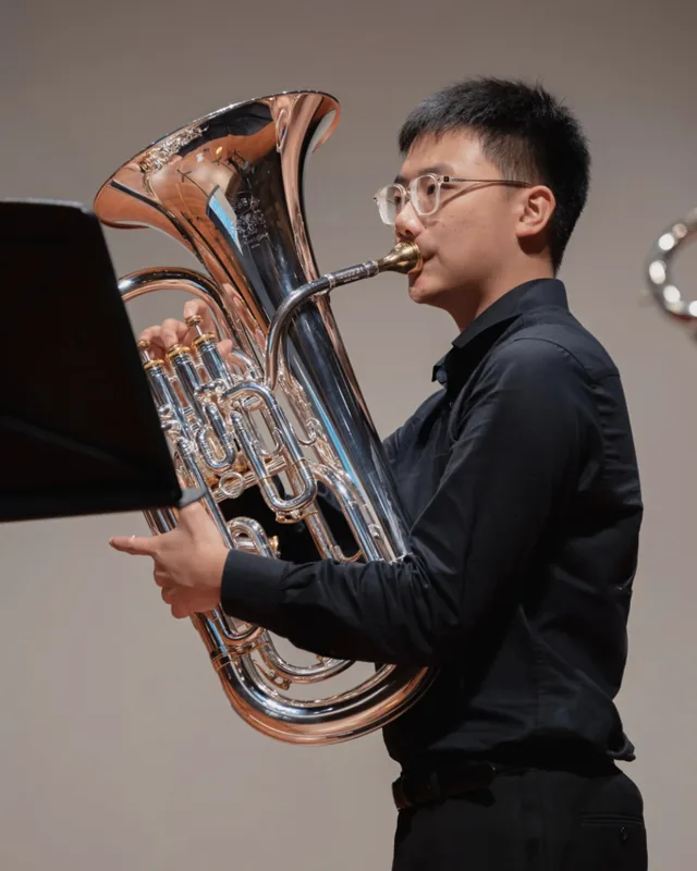 Tay Wei Yuan playing the euphonium