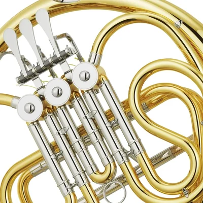 Close-up of the valves and tubing of a brass French horn